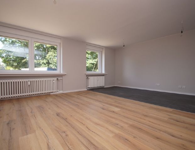 Erdgeschosswohnung mit Garten! - Foto 1