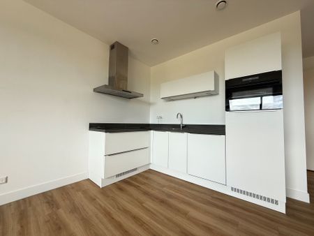 Modern, stijlvol én energiezuinig 2-kamer appartement op een toplocatie met uitstekende bereikbaarheid! - Photo 3