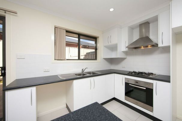 Neat Three Bedroom Townhouse - Photo 1