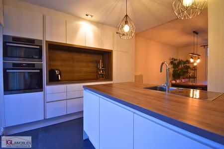 Ruime gezinswoning met 4 slaapkamers, tuin, terras en 2 staanplaatsen te huur - Photo 3