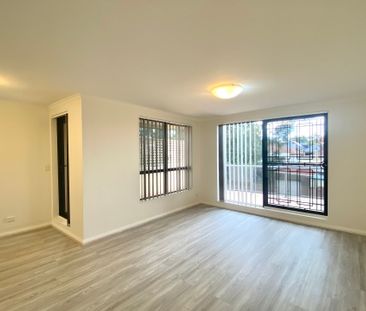 Two Bedroom Unit In A Convenient Location - Photo 2