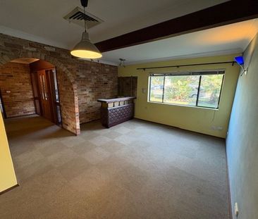 Spacious Family Home with Multiple Living Areas & Water Included - Photo 5