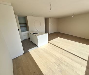 Nieuwbouwappartement in het centrum met terras en 2 autostaanplaatsen - Photo 4