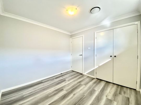 Elegant Family Living in Prestigious Oran Park! - Photo 1