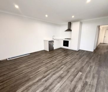 Low-Maintenance Brand New 2x1 Home Just Minutes from the Beach! - Photo 3