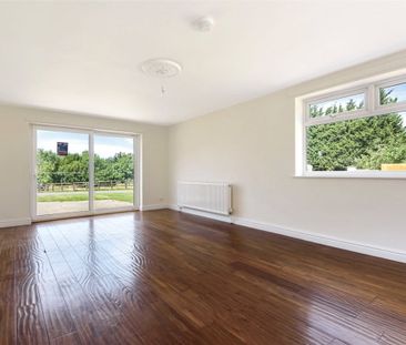 A four bedroom detached bungalow with allocated parking for 2 cars ... - Photo 3