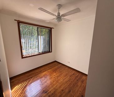 Spacious Family Living with Utilities Included - Photo 2