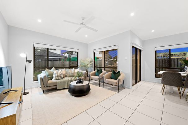 Stylish Double-Storey Home with Space and Comfort - Photo 1