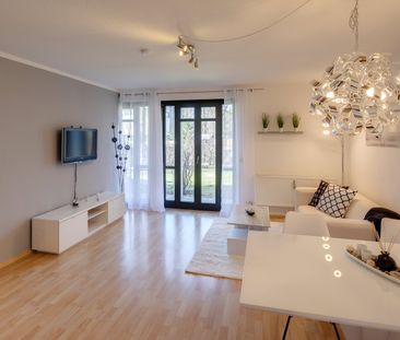 Bright garden apartment with patio for rent - Photo 4