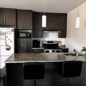 Appartement style condo - Photo 2