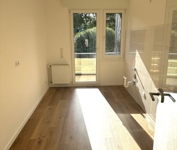 Komplett modernisierte 2 Zimmer Wohnung mit Balkon u. Garage in der Nähe vom Park in Moers-Vinn - Foto 1