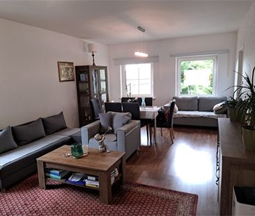 Een appartement op de eerste verdieping met garage en tuintje - Foto 2