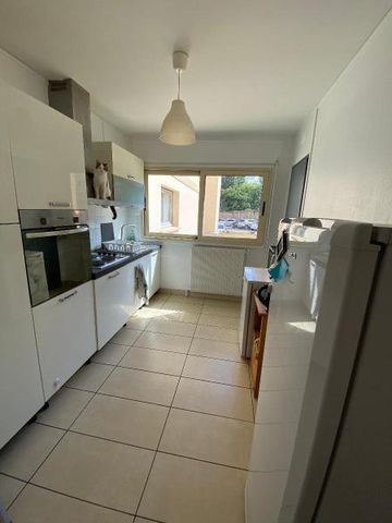 Location Appartement 3 pièces 68m² LYON 8ème - Photo 5
