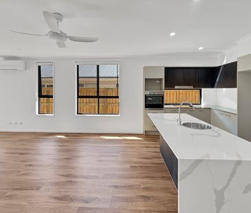 Stylish Family Home with Pool in Sought-After Palmview - Photo 6