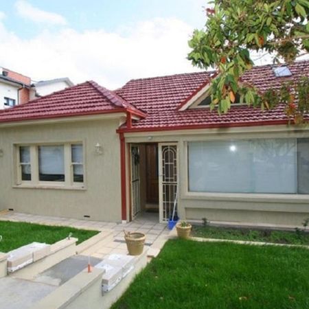Family House in Ultra-Convenient Location ** Available 05/12/25 ** - Photo 3