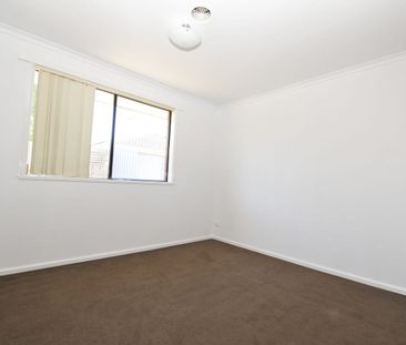 Freshly Painted Family Home with Exceptional Design & Presentation - Photo 4