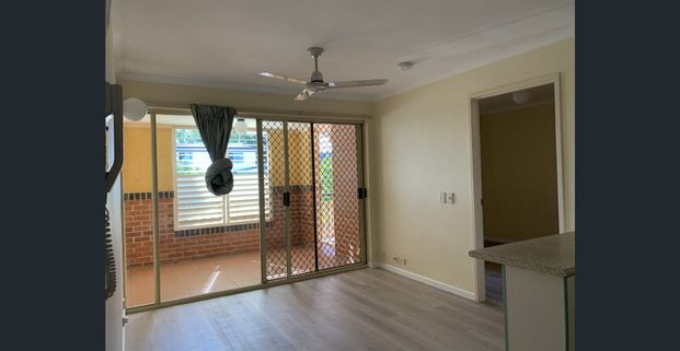 A Quiet Sanctuary Away from The Bustle of The Inner-City with New Flooring, New Paint and New Cooking Appliance. Gated Undercover Car Park. - Photo 1