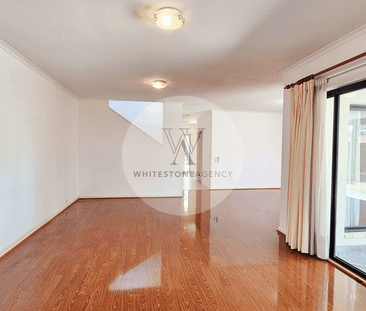 Spacious Double-Storey Home | Central Location - Photo 6