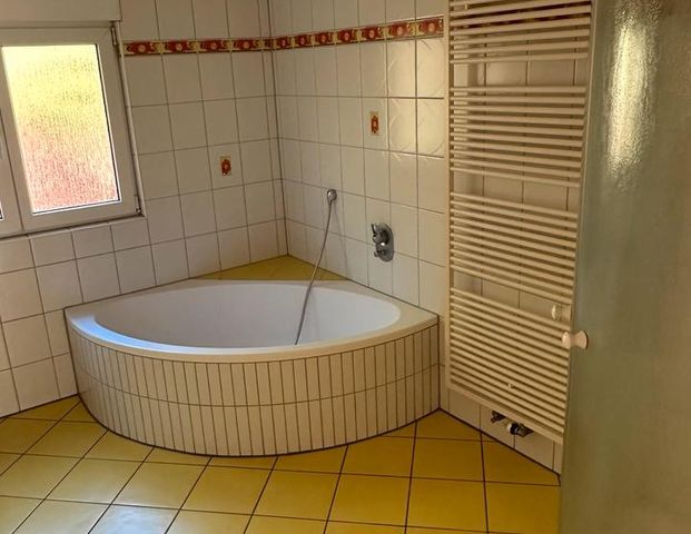 Moderne Dachgeschosswohnung - Foto 1
