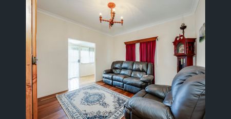 Immaculate Family Home with Shed and Fully Fenced Yard - Photo 2