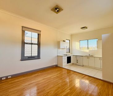Spacious 4-Bedroom Home | Timber Flooring | Walk to Station & Shops - Photo 4