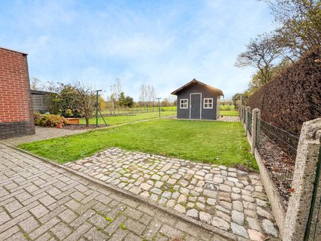 Charmante rustig gelegen woning met ruime tuin en garage! - Photo 5