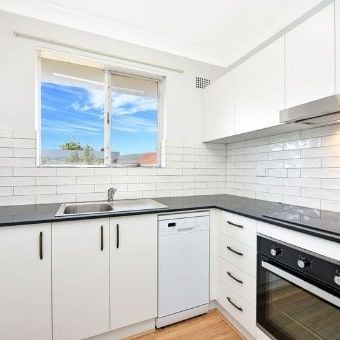 Sun-Kissed, Renovated Top Floor Apartment in the Heart Of North Strathfield - Photo 1