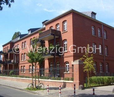 Gehobene 3-Zimmer-Hochparterre-Wohnung mit großer Süd-Terrasse im T... - Foto 1