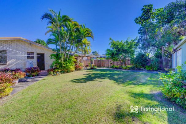 IMMACULATE BRICK HOME WITH SOLAR IN AVENELL HEIGHTS - Photo 1