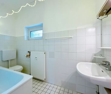 Charmante Erdgeschosswohnung mit kleinem Wintergarten und eigenem G... - Photo 4