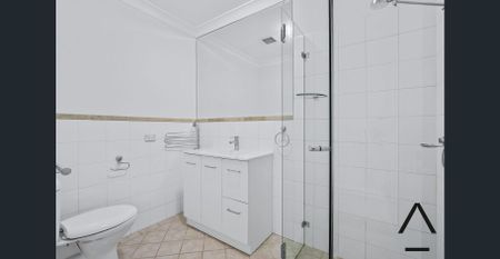 Freshly Painted Large Open Plan Two Bedroom Townhouse - Photo 5