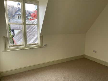 A sensitively modernised three bedroom cottage situated within a complex of Grade II listed buildings and adjoining the National Trust gardens with magnificent views towards the Carneddau mountain range. - Photo 2