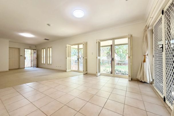 Elegant Corner Townhouse with Courtyard Living in a Prime Strathfield Location - Photo 1