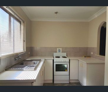 Spacious Unit Living with Secure Parking & Convenient Location - Photo 4