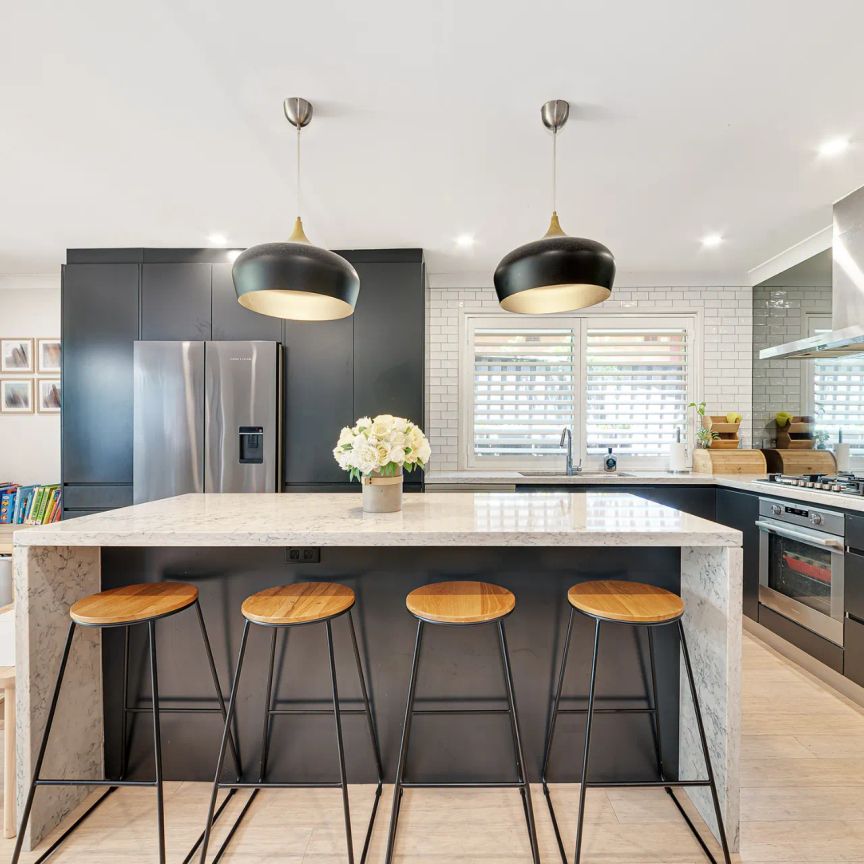 Beautifully Renovated and Exceptionally Convenient Three-Bedroom Home - Photo 1