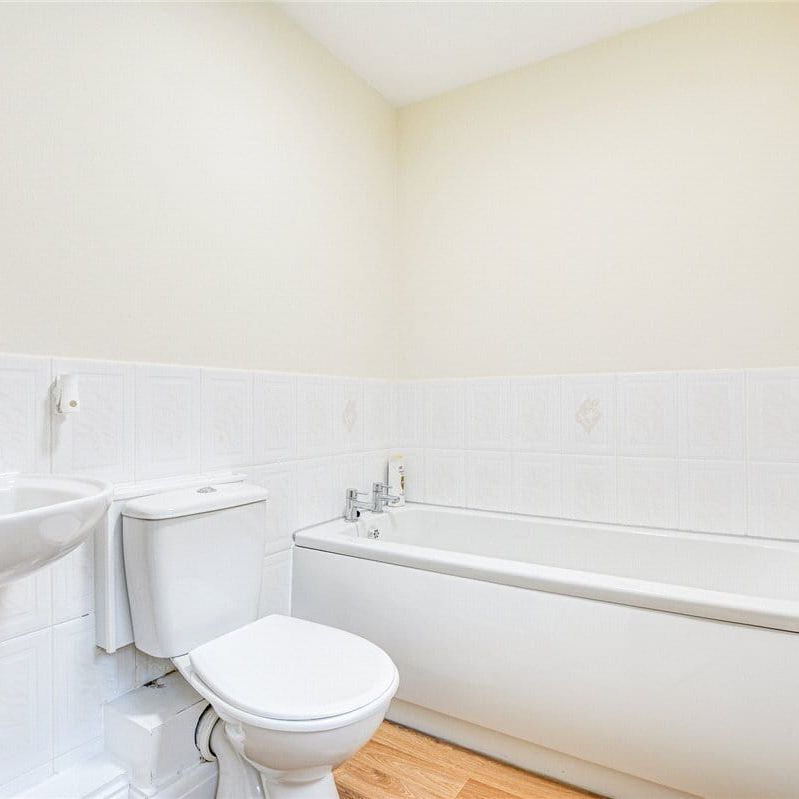 A 2 bedroom detached bungalow with a garage and driveway parking in Lowton. - Photo 1