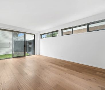 Stylish, Spacious Living with Modern Comfort Across Two Levels - Photo 1