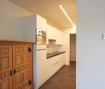 Ruim, gelijkvloers appartement met 2 slaapkamers, terras en een aut... - Foto 5