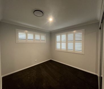 Stylish Modern Home with Ducted A/C & Water Included - Photo 6