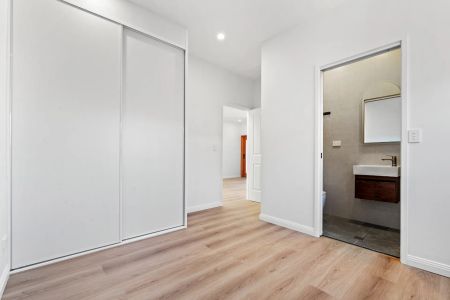 Immaculate Family Home - Freshly Renovated In Prime Location with Water Views - Photo 3