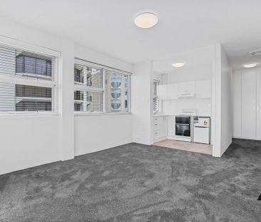 Renovated Studio Apartment with Large Terrace and District Views - Photo 6