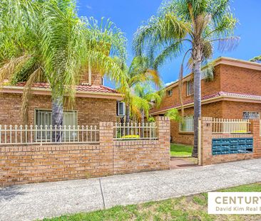 Secure & Bright Two Bedroom Townhouse with Double Garage - Photo 1