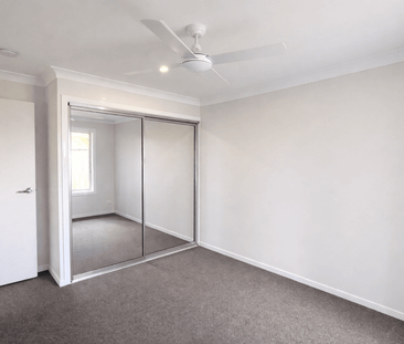 Stylish Family Home with Space & Comfort - Photo 3