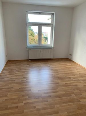 Erdgeschosswohnung mit Einbauküche - Photo 1