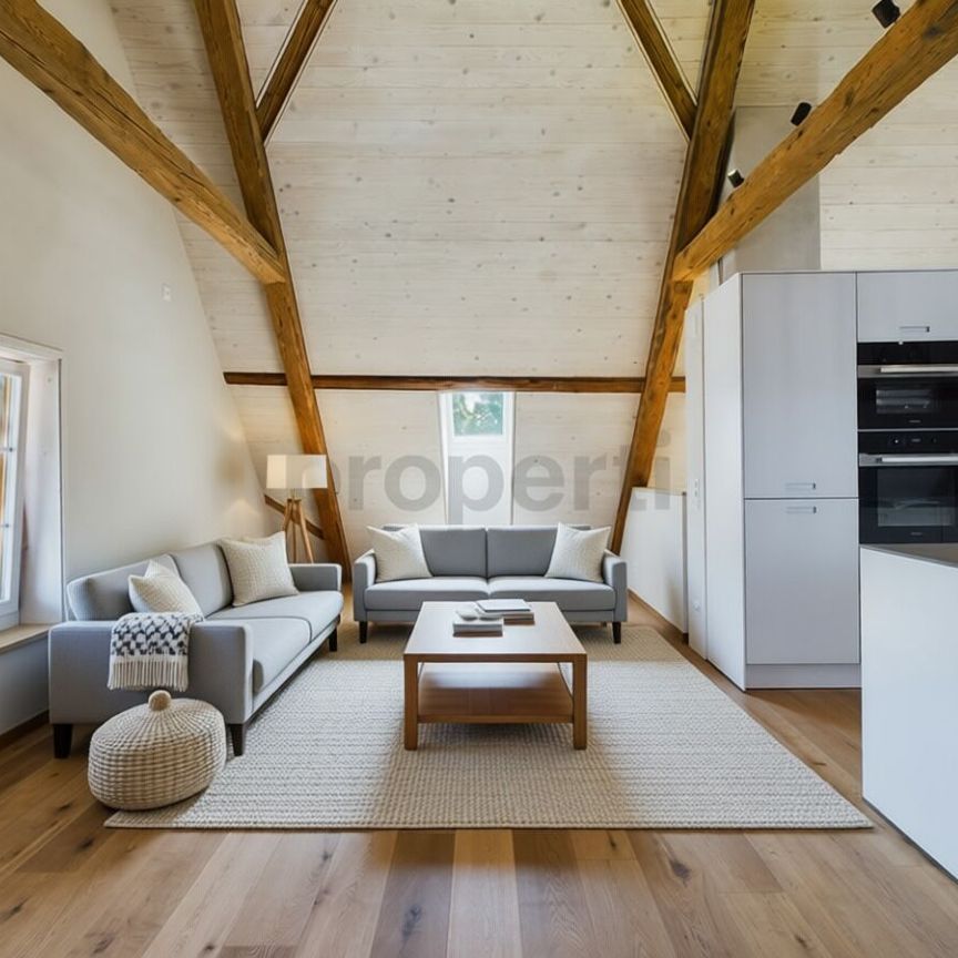 Charming 3.5-room penthouse apartment in a central location in Bätterkinden - Photo 1