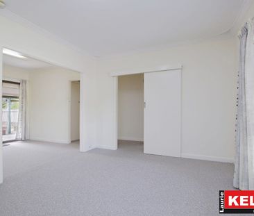 Spacious 3 Bedroom Home with Air-Conditioning & Large Backyard! - Photo 1