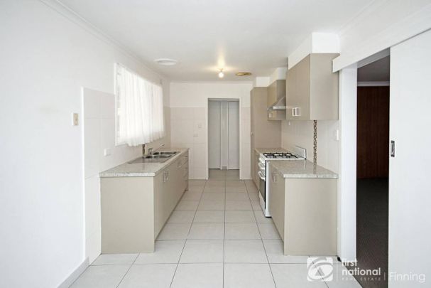 Freshly painted three bedroom home - Photo 1