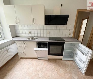 Schicke 2-Raum-Wohnung mit Einbauküche in ruhiger Lage! - Photo 6