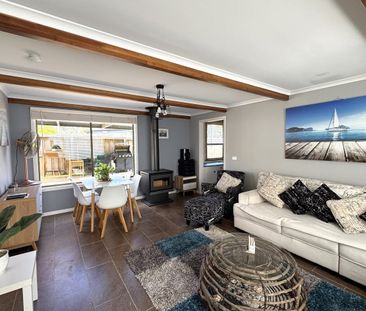 Fully Furnished 4 Bedroom - Ultimate Coastal Living - Photo 1