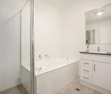 Spacious Four-Bedroom Duplex with Everything You Need - Photo 6